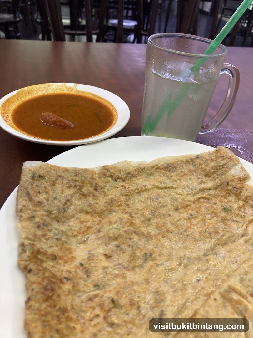 Roti Canai with Curry and Drink