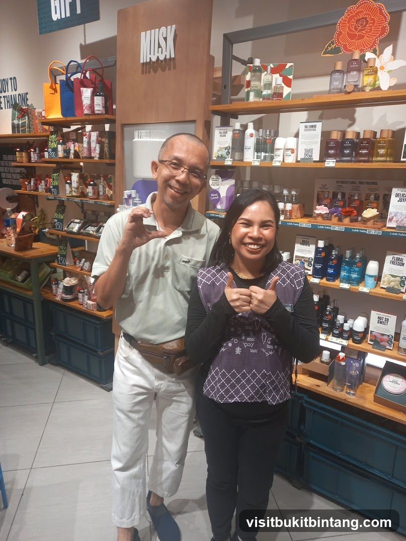 Two people smiling in a store