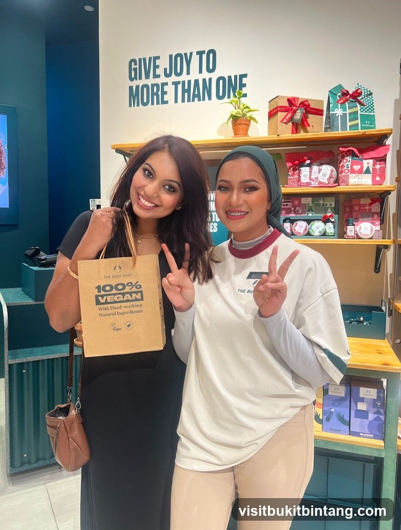 Two women posing in a store