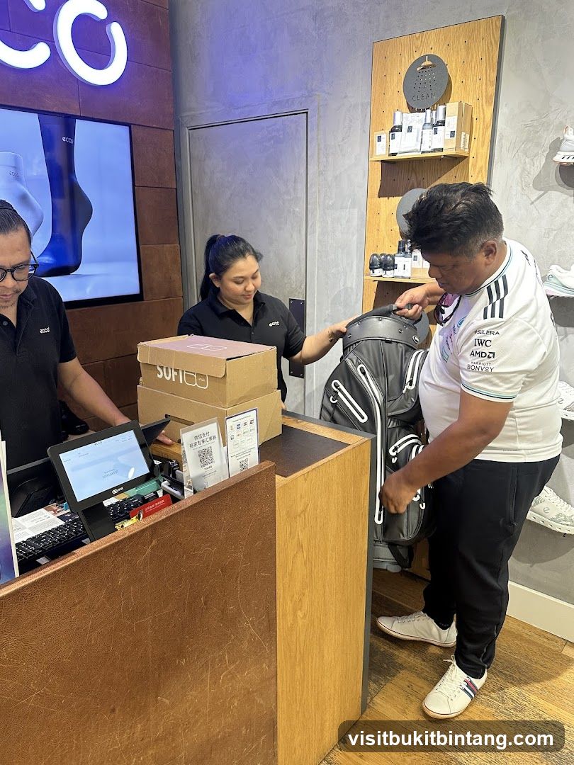 Store interior with staff and customer