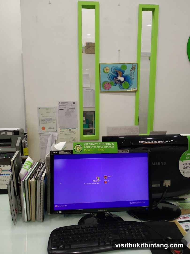 Computer Desk with Services Sign