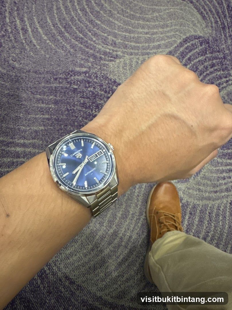 Man wearing a watch and shoes