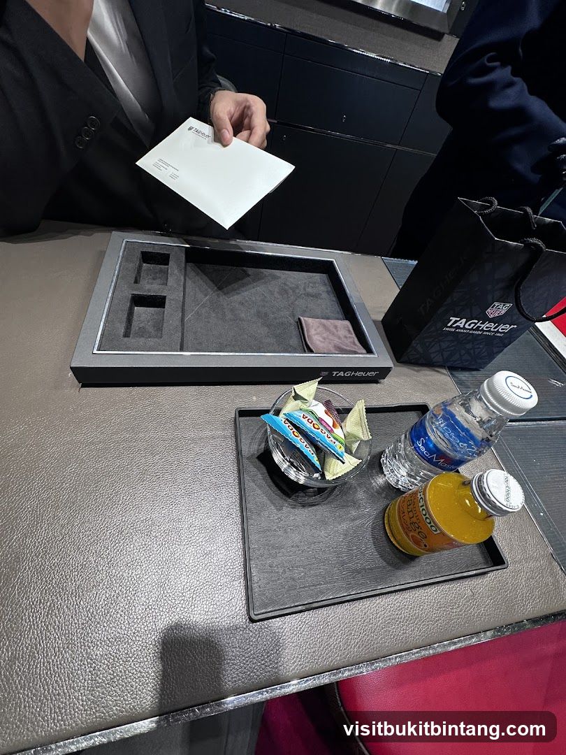 Watch display with refreshments