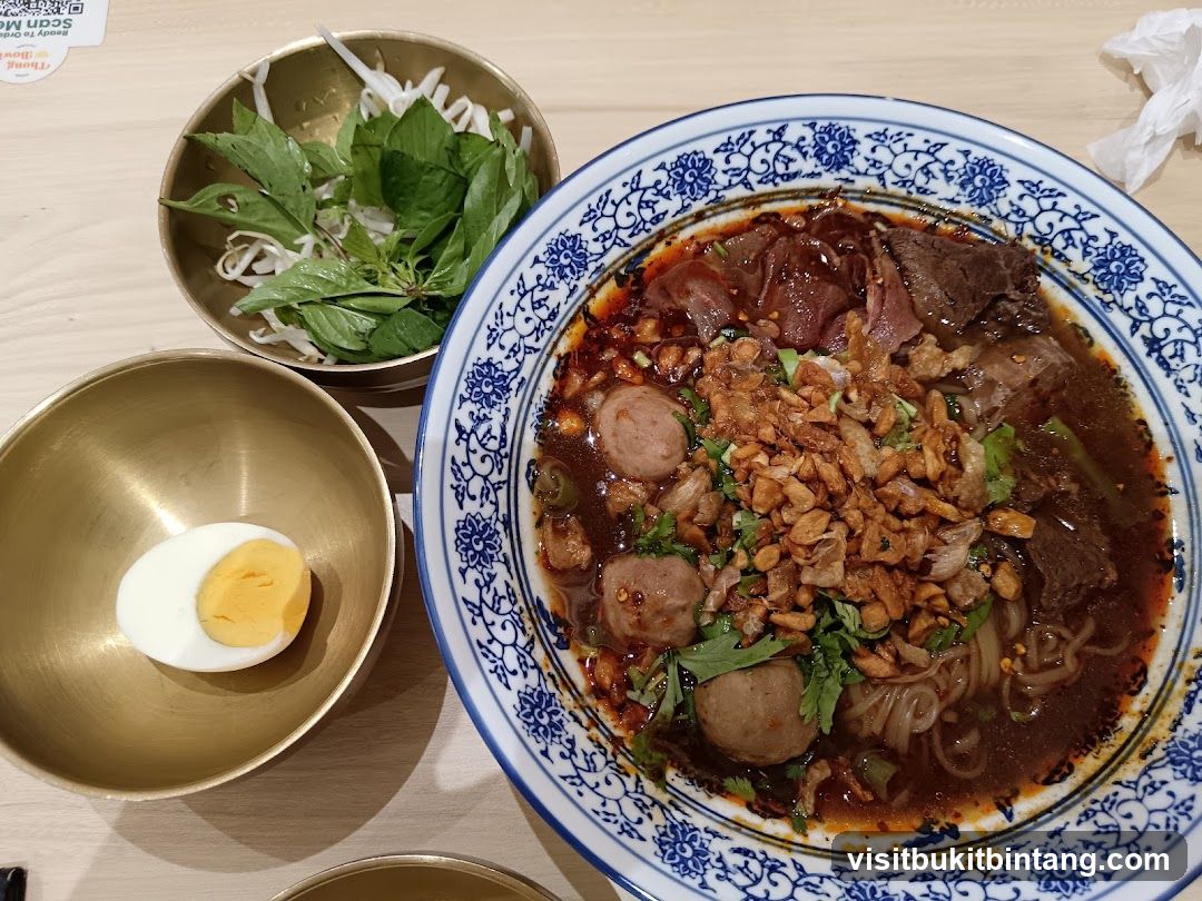 Beef noodle soup with side dishes