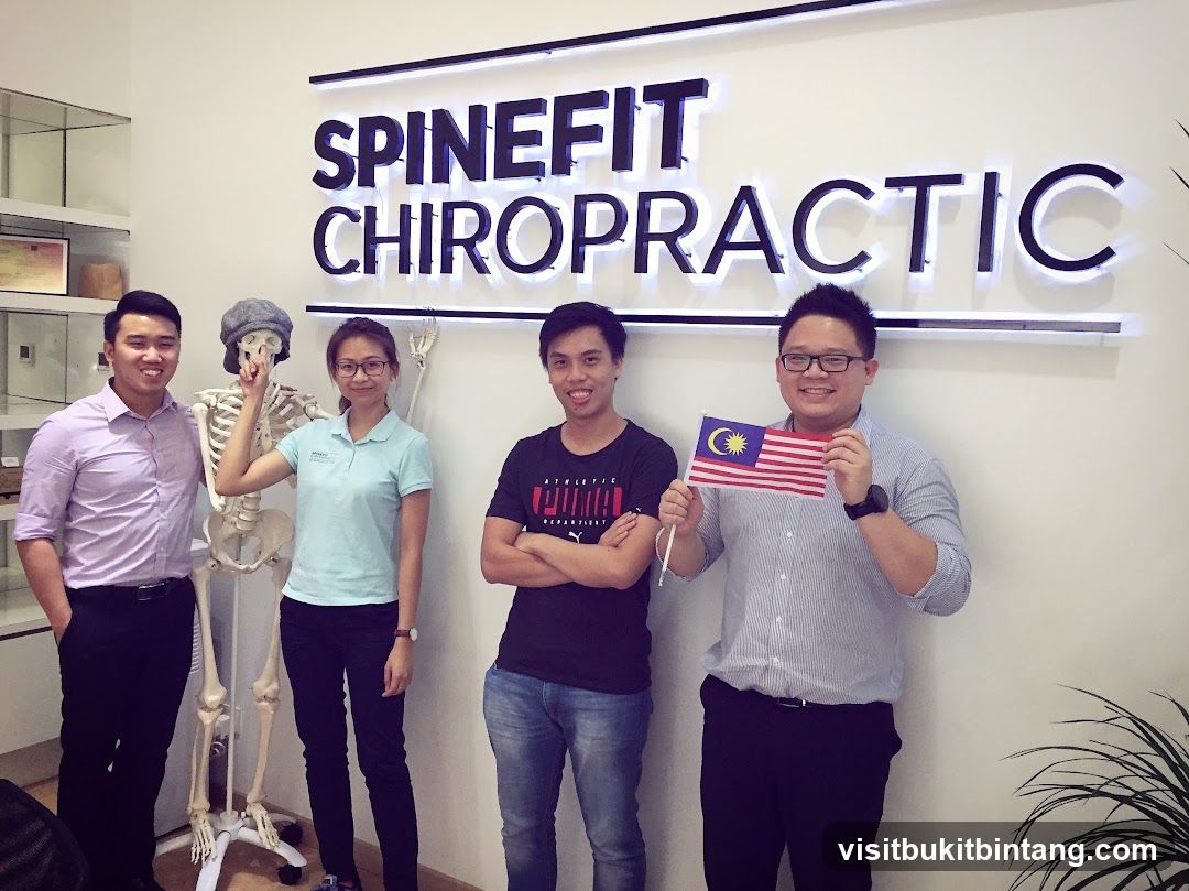 Spinefit Chiropractic Staff with Malaysian Flag