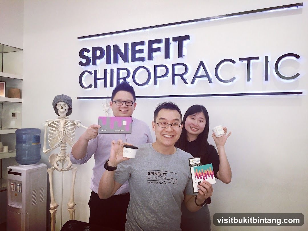 Spinefit Chiropractic Staff with Promotional Items
