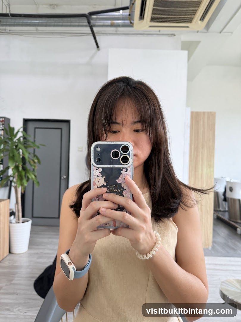 Woman taking a selfie in a salon