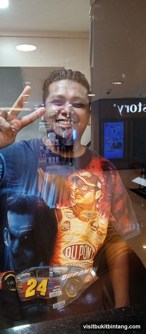 Man in front of store window
