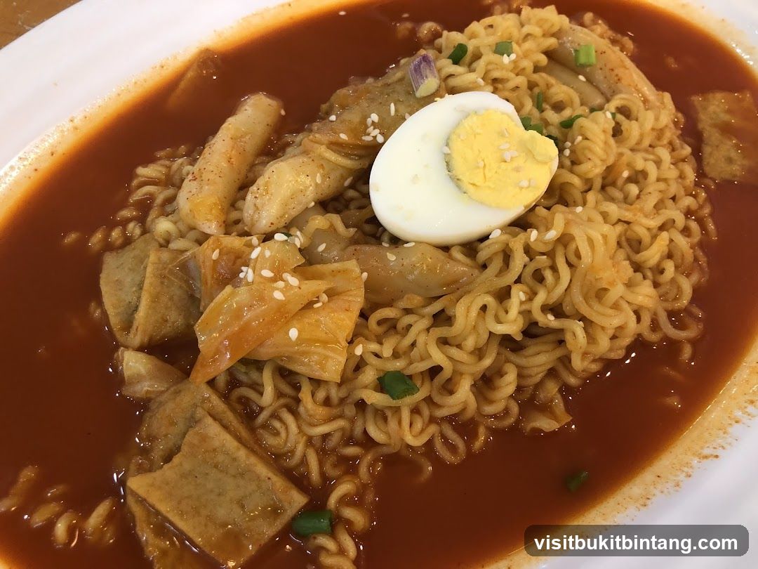 Spicy Noodle Soup with Egg and Fish Cakes