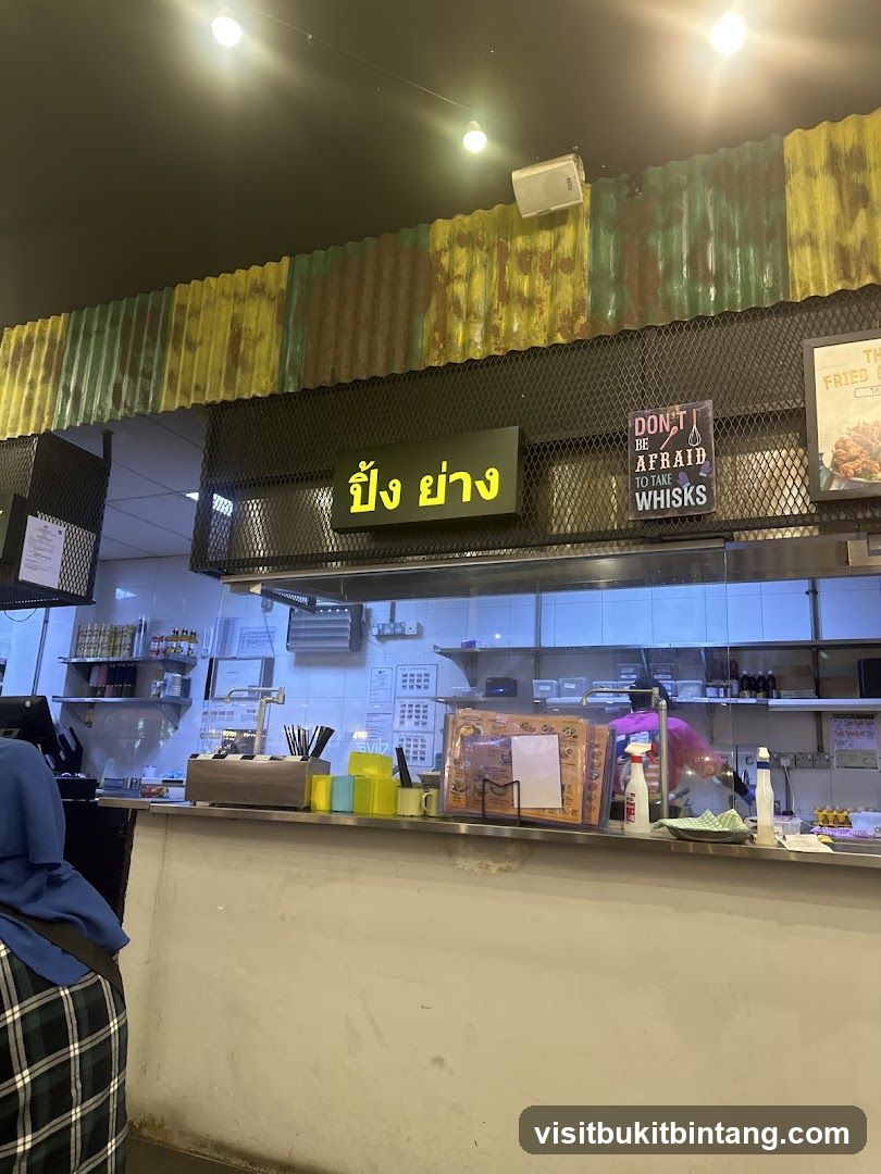 Restaurant Counter with Thai Signage