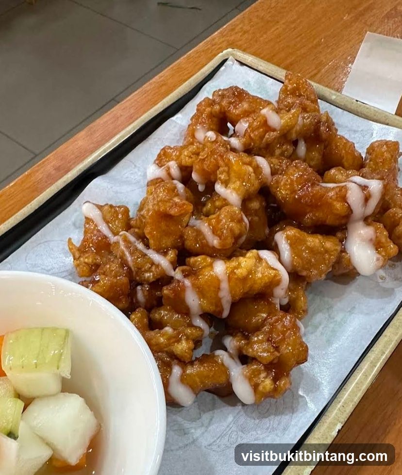 Fried Chicken Bites with Sauce and Pickled Vegetables