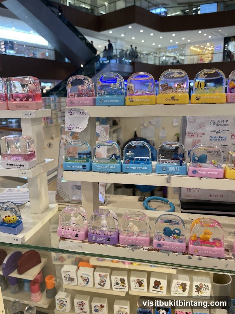 Assortment of Water Snow Globes and Stamps