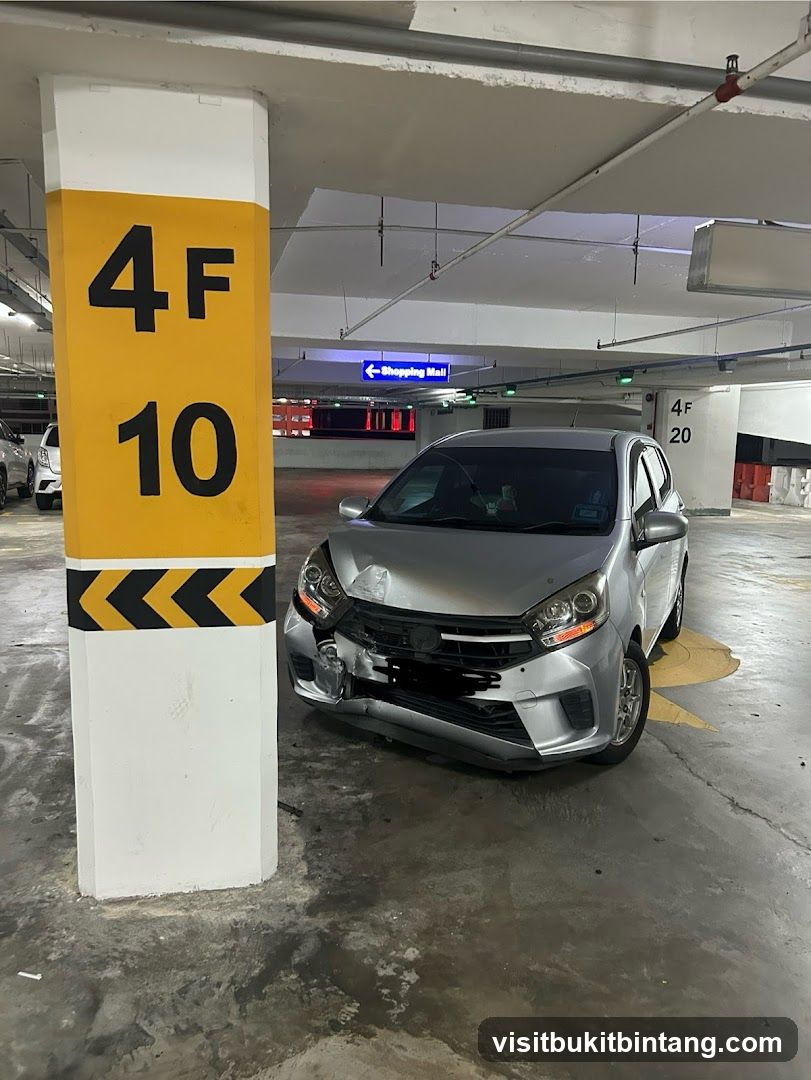 Damaged car in parking lot