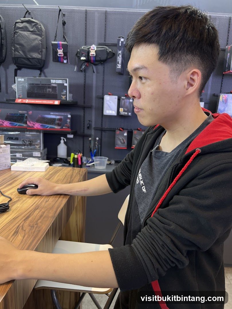 Man using a computer mouse in a store