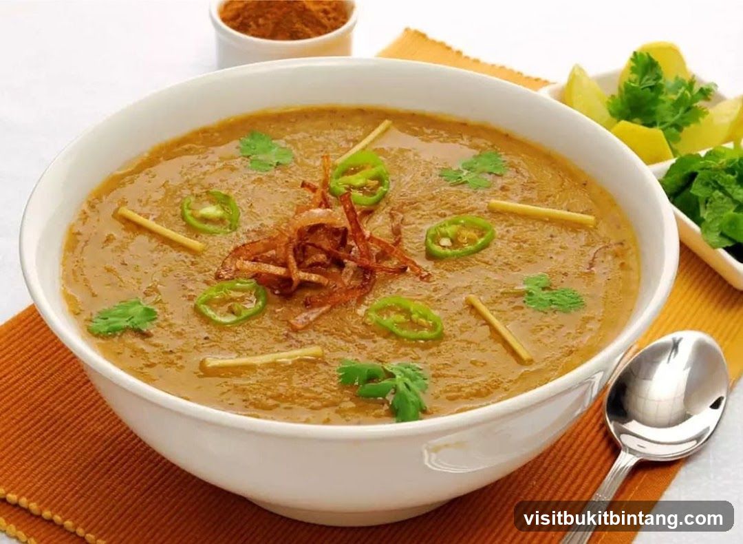 Bowl of Haleem with garnishes