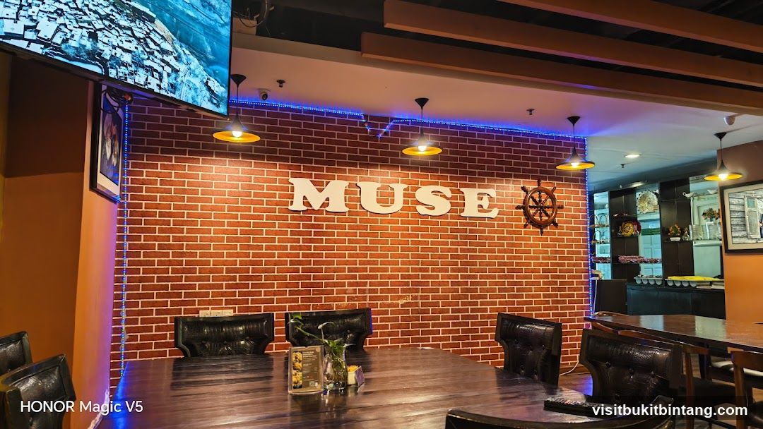 Restaurant Interior with Brick Wall and "MUSE" Sign