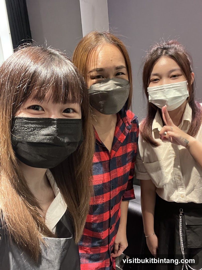 Three women wearing masks