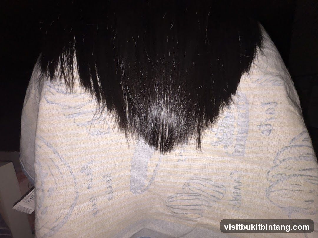 Hair over patterned fabric