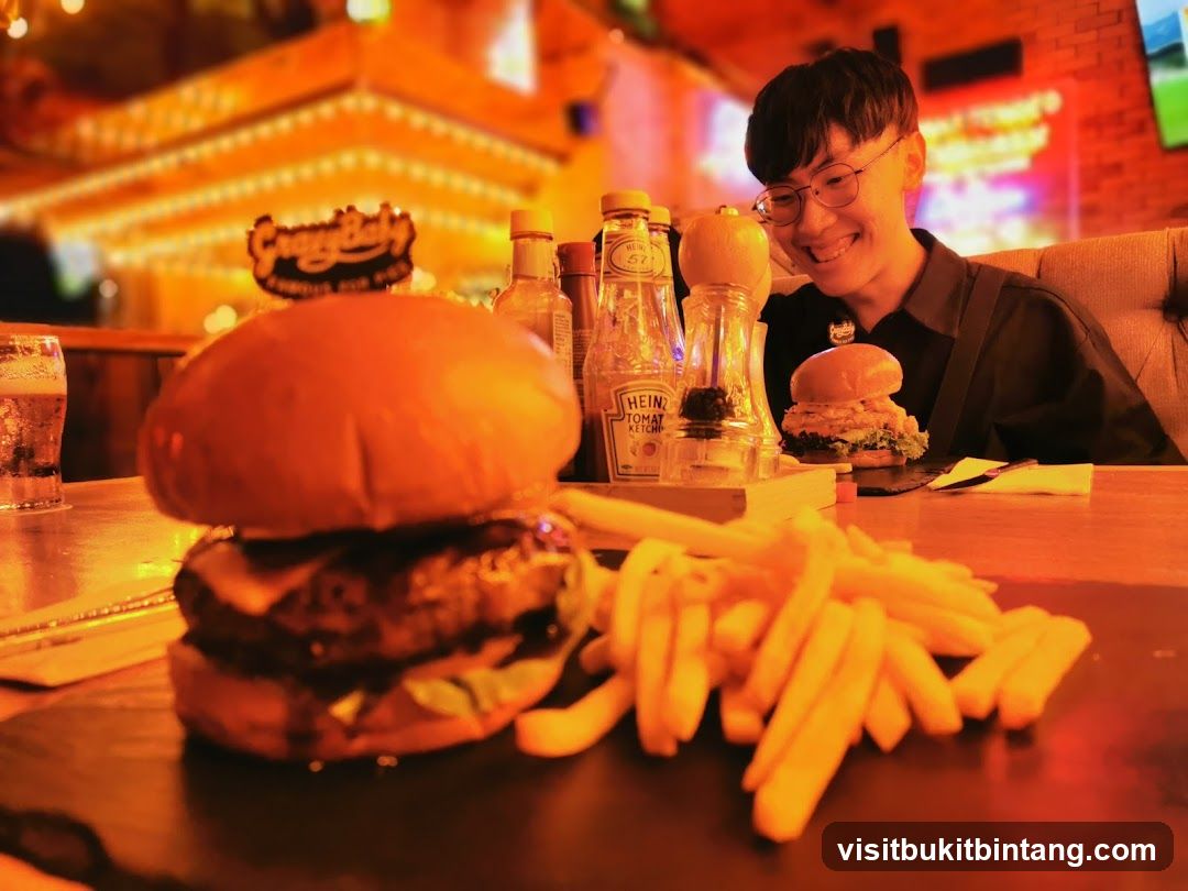 Man Enjoying a Burger and Fries