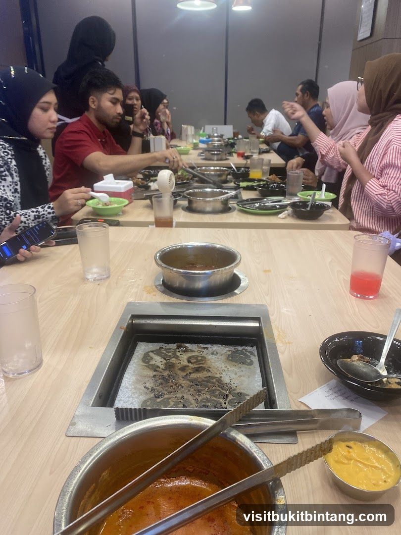 People dining at a hot pot restaurant