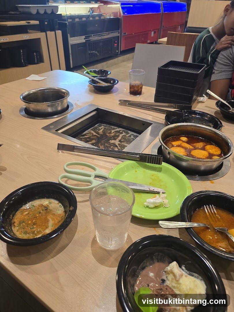 Table with Hot Pot and Desserts
