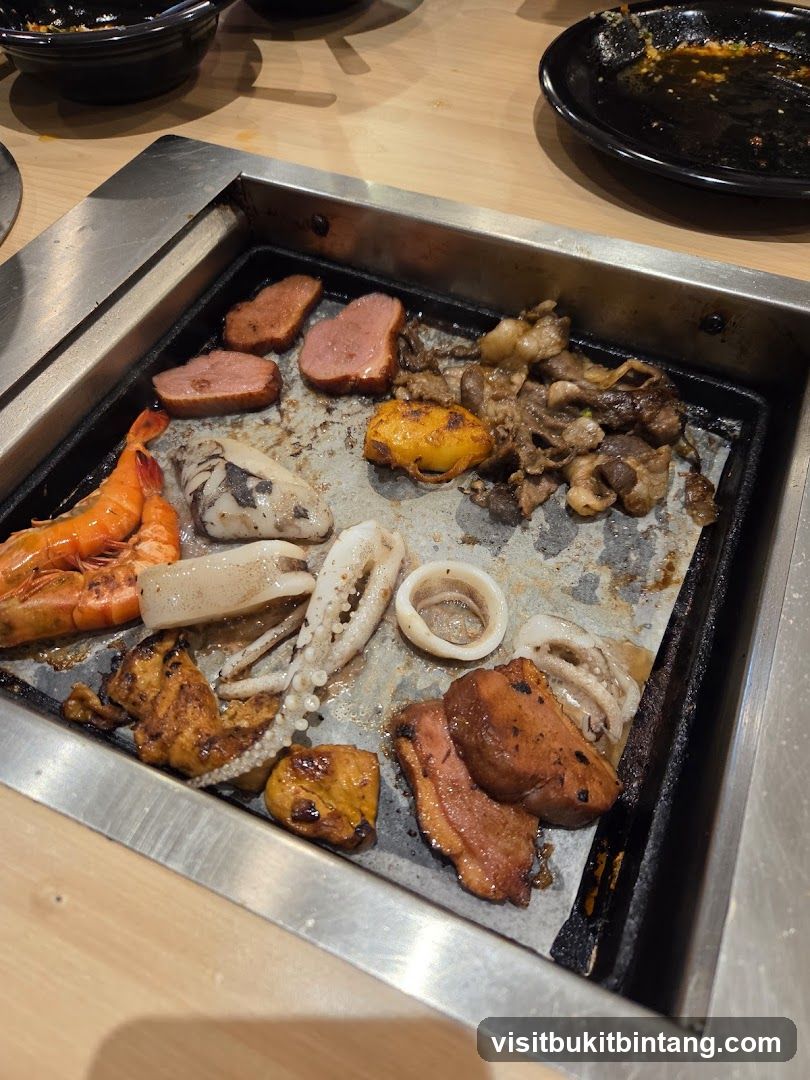 Grill with various meats and seafood