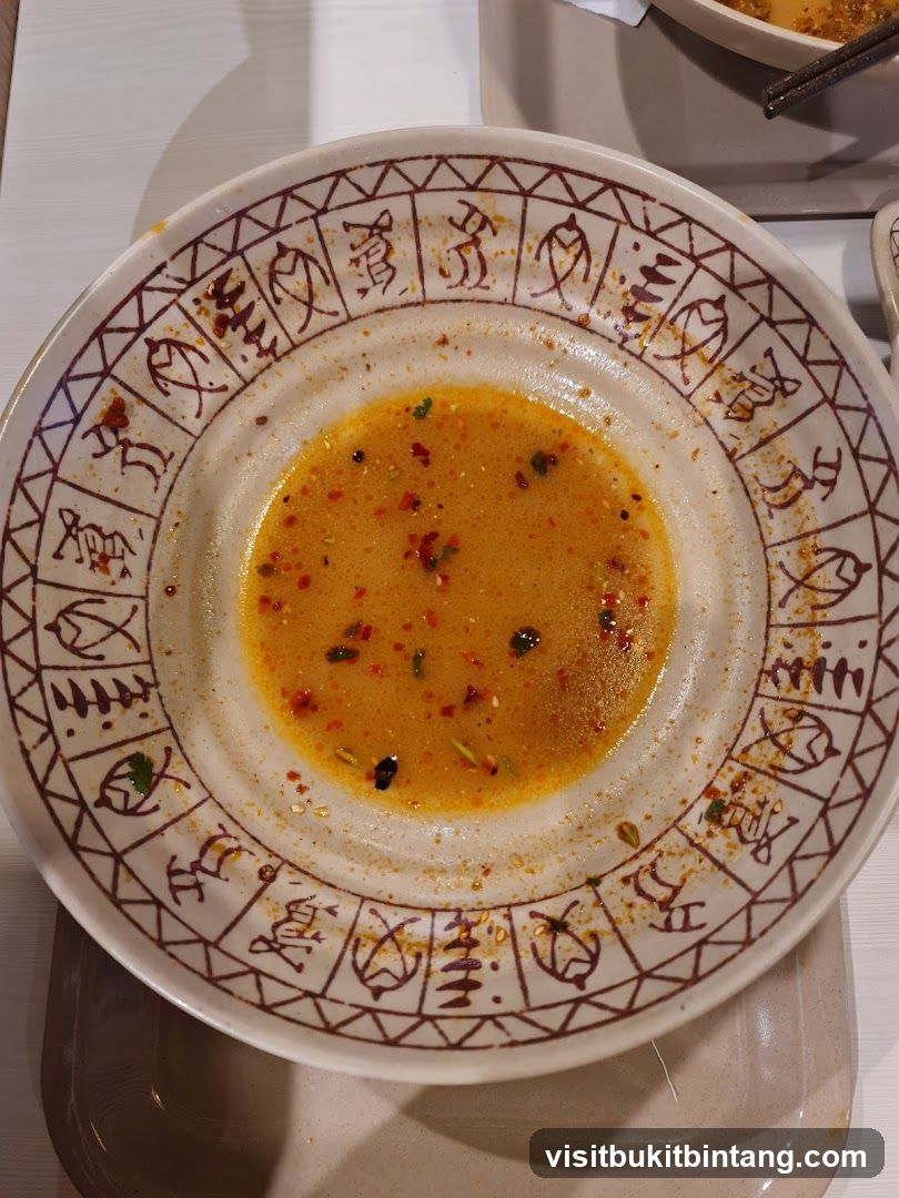 Partially Eaten Bowl of Soup