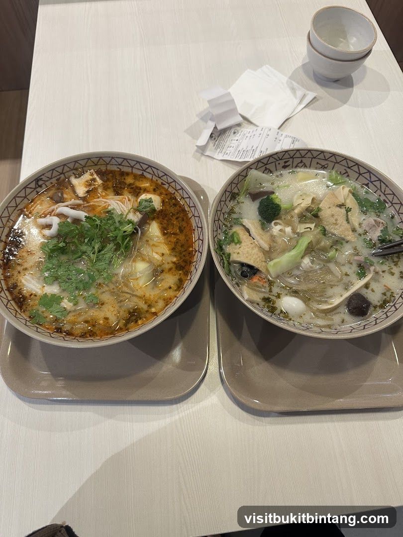 Two bowls of soup on a table