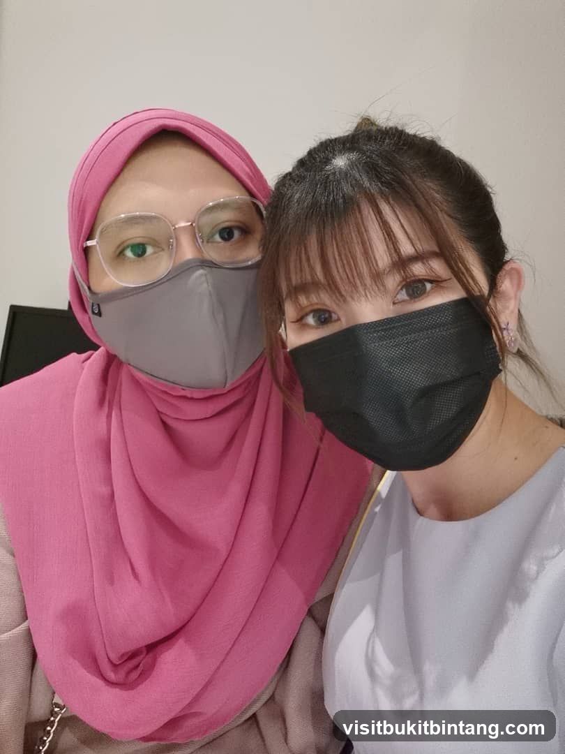Two women wearing face masks