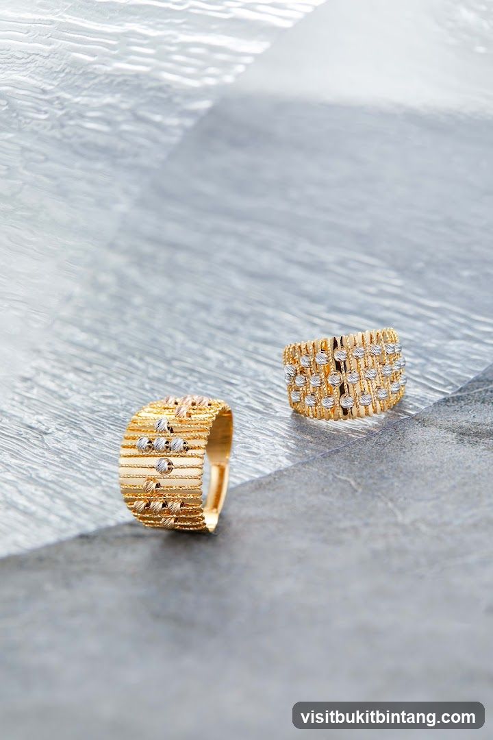 Two gold rings with white gold accents