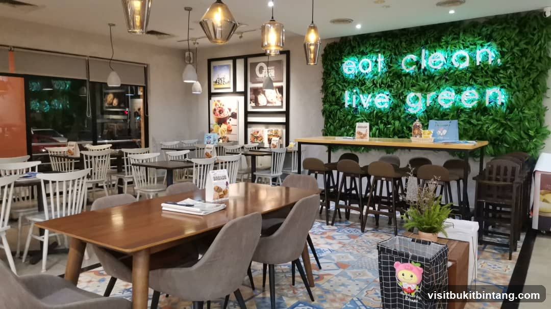 Restaurant Interior with Green Wall and Neon Sign