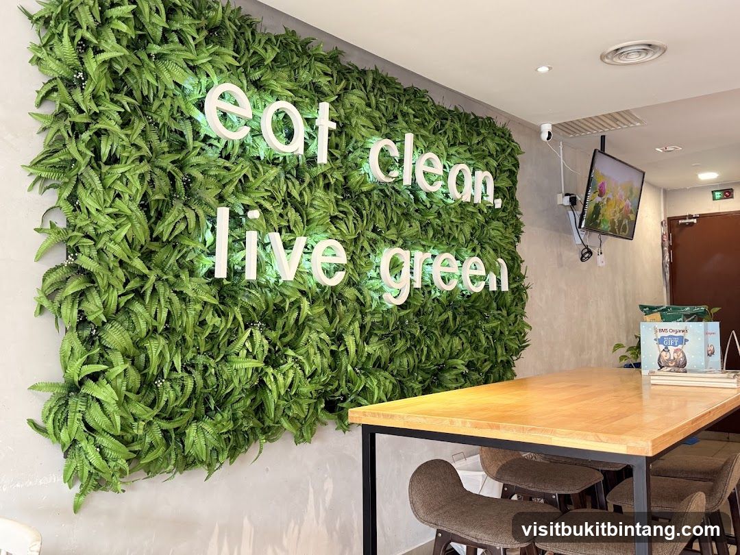 Wall with "eat clean, live green" neon sign