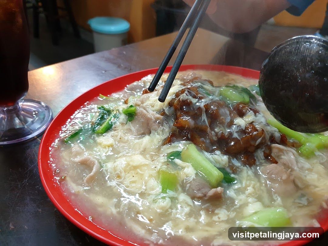 Noodle Soup with Chopsticks and Ladle