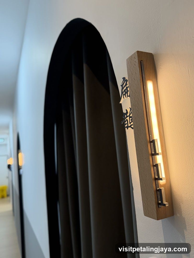 Interior hallway with wall sconce