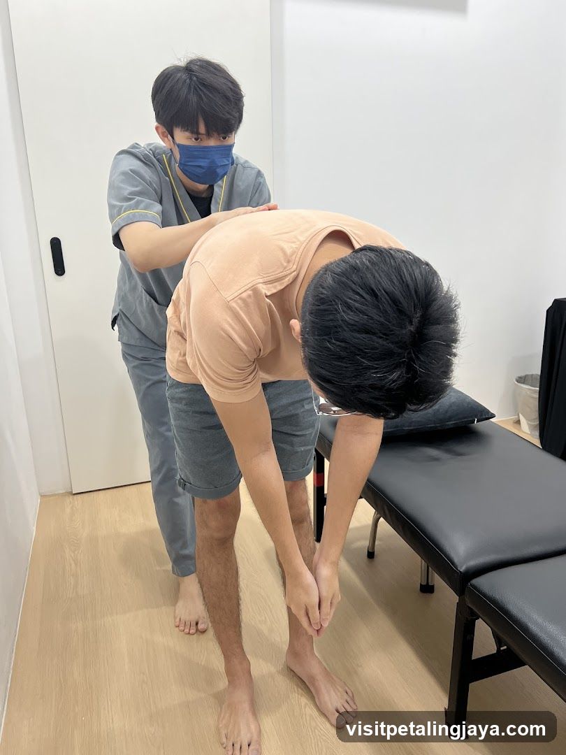 Therapist Assisting Patient with Stretching Exercise