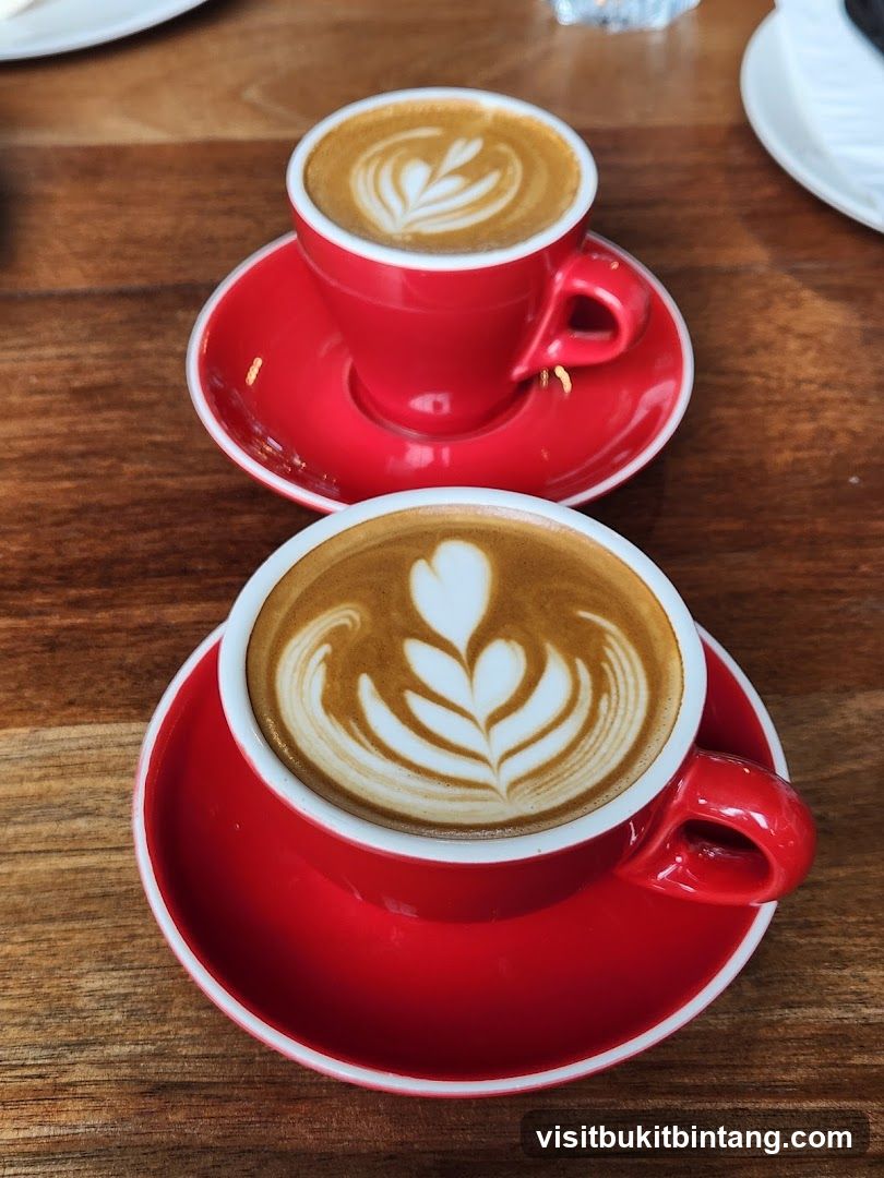Two coffees with latte art