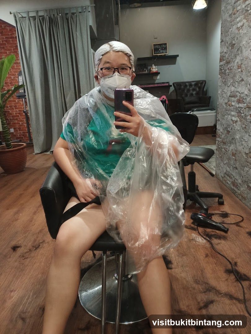Person getting hair dyed