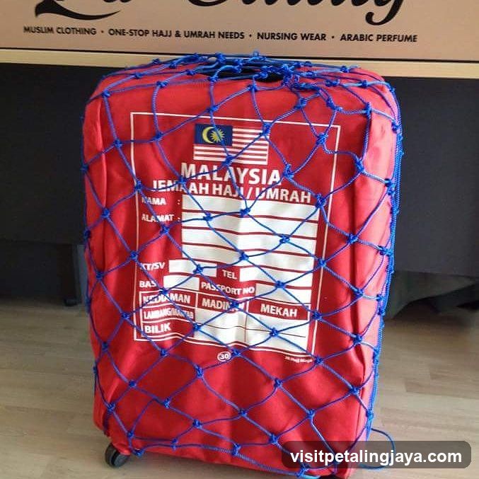 Red Luggage Cover with Malaysia Hajj/Umrah Form