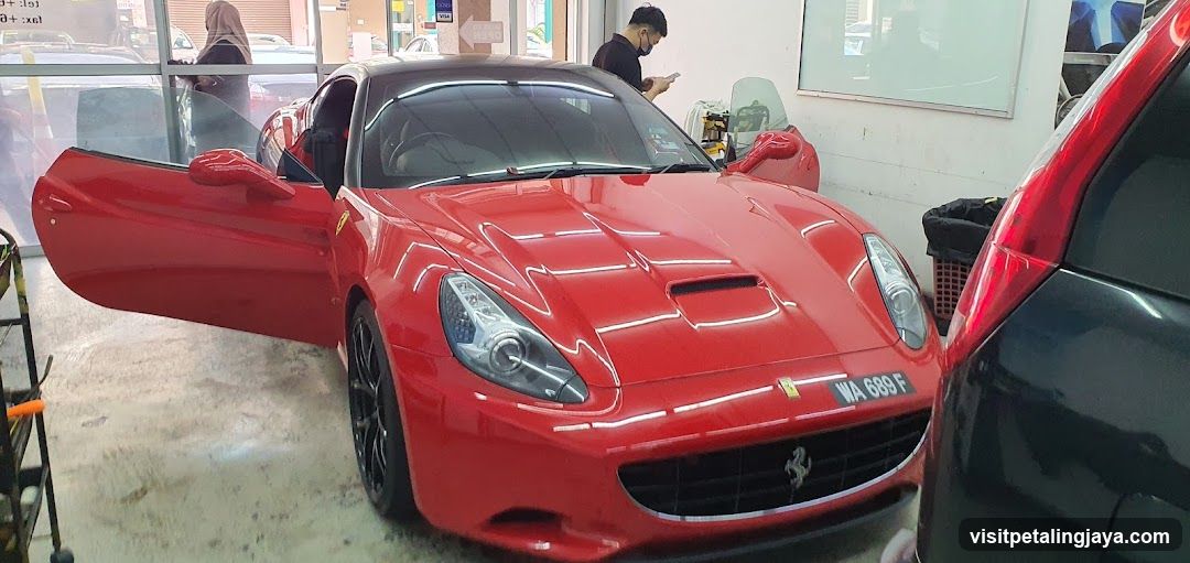 Red Ferrari in Workshop