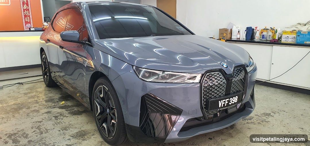 BMW iX in a workshop or detailing shop