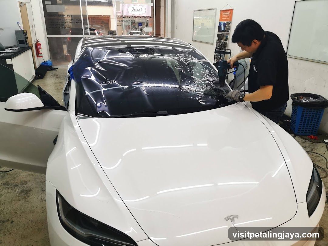 Car Wrap Application in Workshop