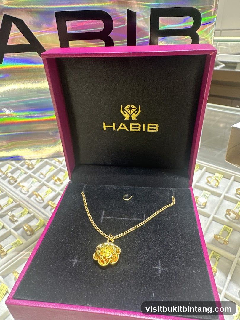Gold Flower Pendant Necklace in a Jewelry Box