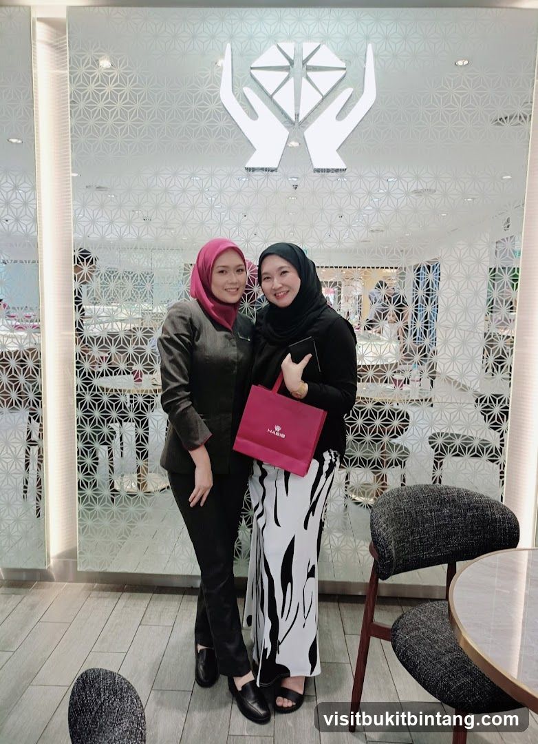 Two women posing in front of a store