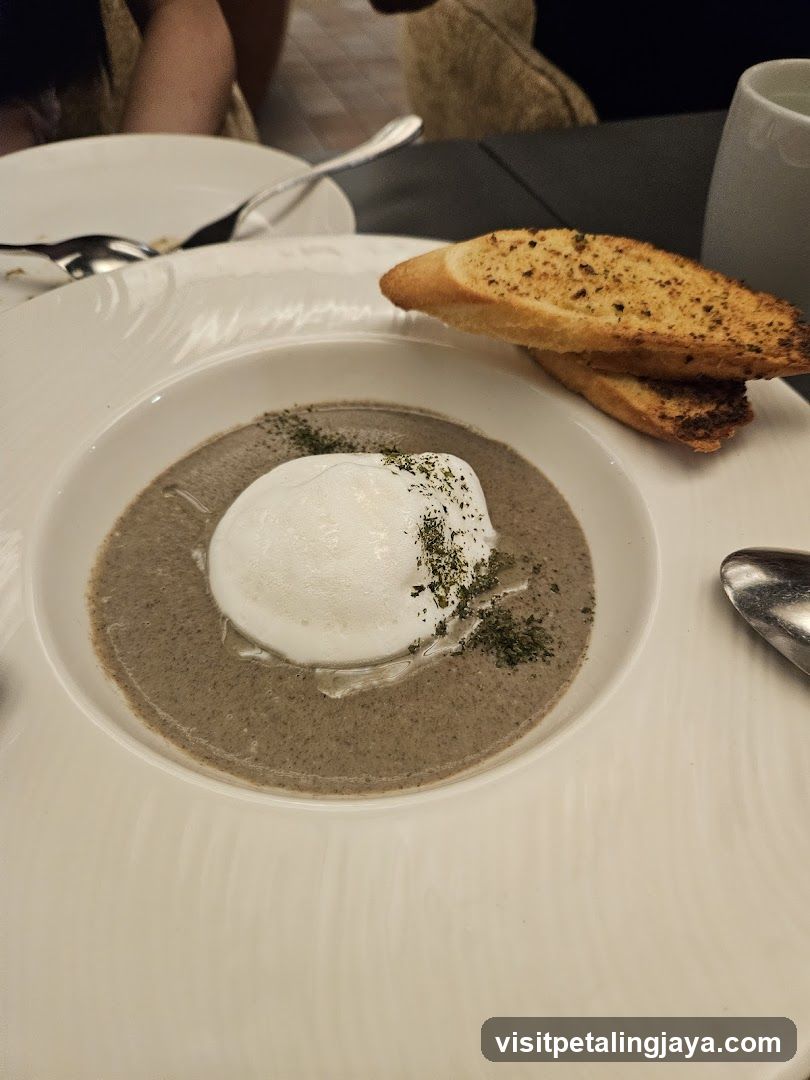 Mushroom Soup with Poached Egg and Garlic Bread