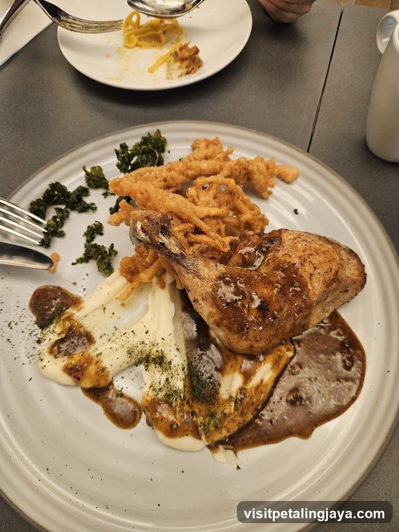 Chicken Dish with Mashed Potatoes and Fries