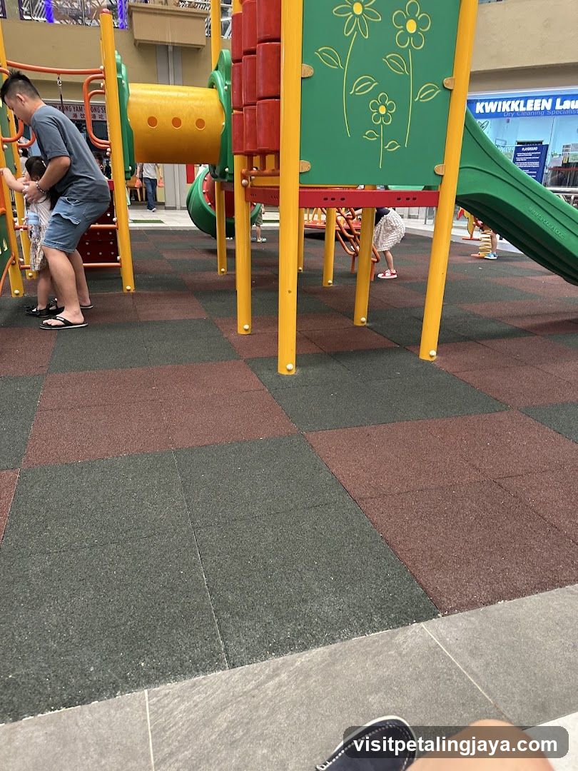 Playground Area with Storefront in Background