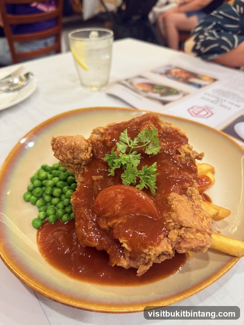 Fried Chicken Dish with Peas and Fries