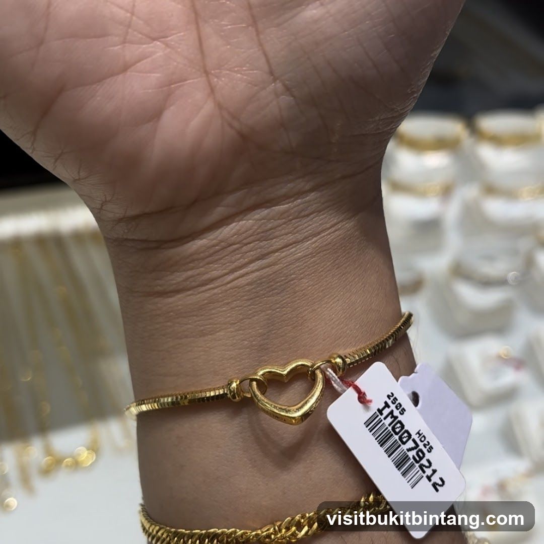 Gold Bracelet with Heart Charm