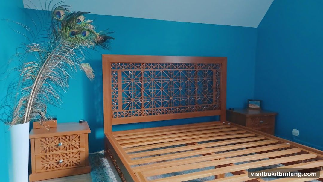 Bedroom with Peacock Feathers and Ornate Bed Frame
