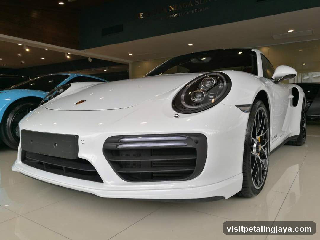 White Porsche in showroom